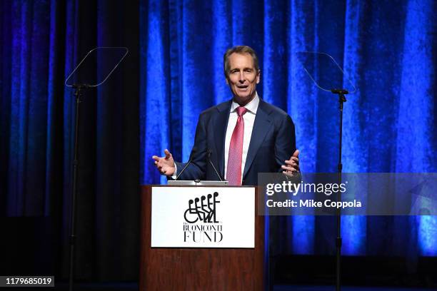 Cris Collinsworth speaks onstage during the 34th Annual Great Sports Legends Dinner To Benefit The Buoniconti Fund To Cure Paralysis at The Hilton...