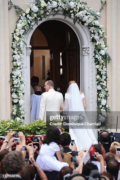 Prince Albert II of Monaco and Princess Charlene of Monaco arrive at Sainte Devote church after the religious ceremony of their Royal Wedding at the...