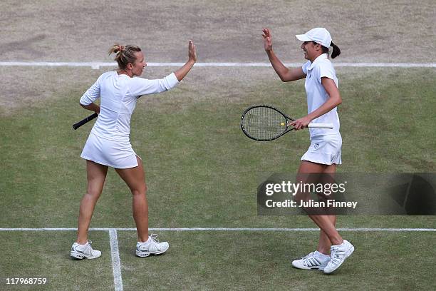 Kveta Peschke of the Czech Republic and Katarina Srebotnik of Slovenia in action during their final round Ladies' doubles match against Sabine...