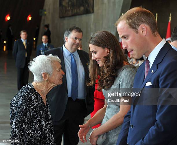 Catherine, Duchess of Cambridge and Prince William, Duke of Cambridge meet former nurse Ida Crocker, who served in England Italy during World War II,...