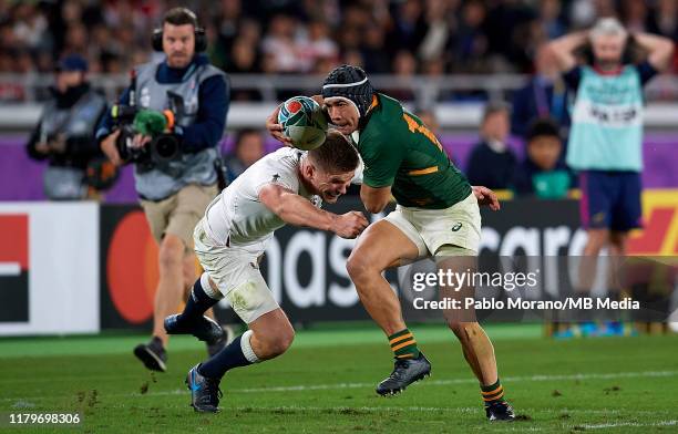 Cheslin Kolbe of South Africa in action under pressure during the Rugby World Cup 2019 Final between England and South Africa at International...
