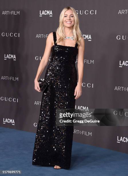Sienna Miller arrives at the 2019 LACMA Art + Film Gala Presented By Gucci at LACMA on November 2, 2019 in Los Angeles, California.