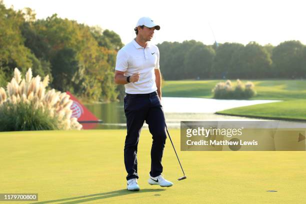 Rory McIlroy of Northern Ireland celebrates victory in a playoff on the 18th green during Day Four of the WGC HSBC Champions at Sheshan International...