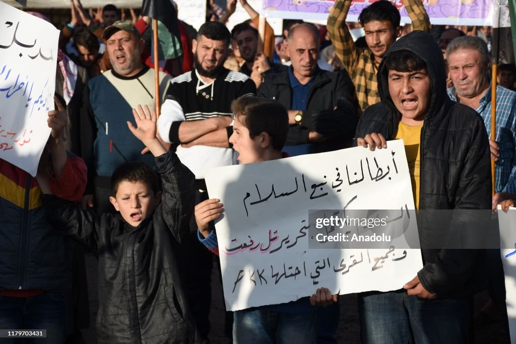 People of Tal Rifaat gather for a protest in Syria's Azez district