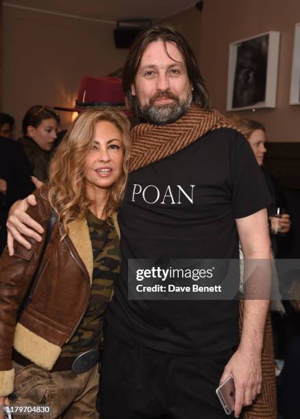 Ghada Sawiris and Patrick O'Neill attend the special screening for 'Habitat' at Soho House on November 3, 2019 in London, England.