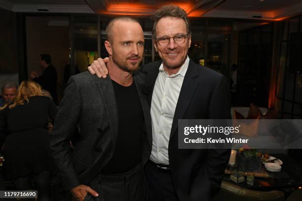 Aaron Paul and Bryan Cranston attend the Premiere of Netflix's "El Camino: A Breaking Bad Movie" After Party at Baltaire on October 07, 2019 in Los...