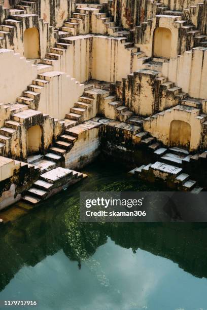 ancient stepwell chand baori biggest stepwell near jaipur rajasthan india - stepwell india stock pictures, royalty-free photos & images