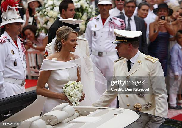 Princess Charlene of Monaco and Prince Albert II of Monaco make their journey to Sainte Devote church after their religious wedding ceremony at the...