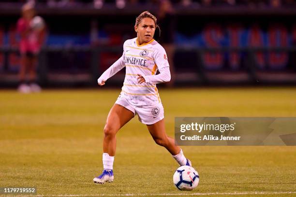 Lo'eau LaBonta of Utah Royals FC looks to move the ball during the match against the Seattle Reign FC at Cheney Stadium on September 25, 2019 in...