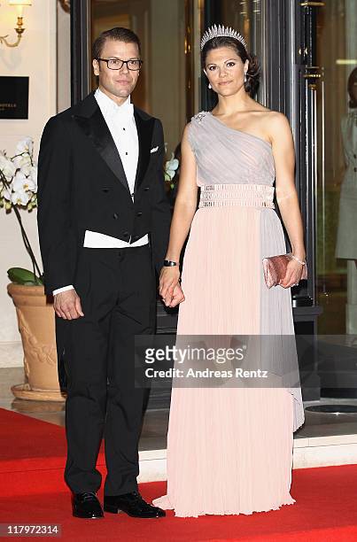 Crown Princess Victoria of Sweden and husband Prince Daniel, Duke of Vastergotland leave the Hotel Hermitage to attend a dinner at Opera terraces...