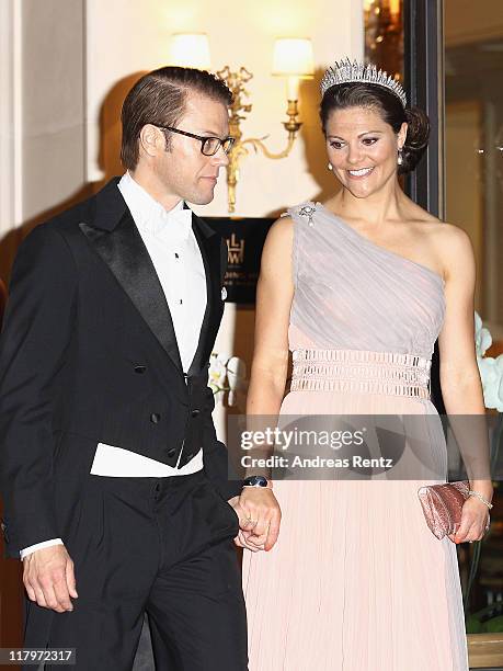 Crown Princess Victoria of Sweden and husband Prince Daniel, Duke of Vastergotland leave the Hotel Hermitage to attend a dinner at Opera terraces...