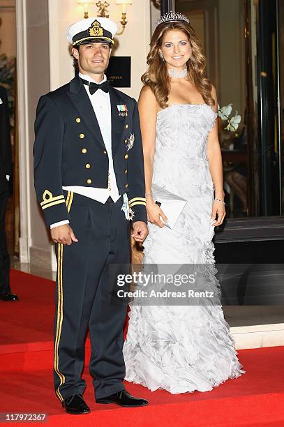 Princess Madeleine of Sweden and Prince Carl-Philip of Sweden leave the Hotel Hermitage to attend a dinner at Opera terraces after the religious...