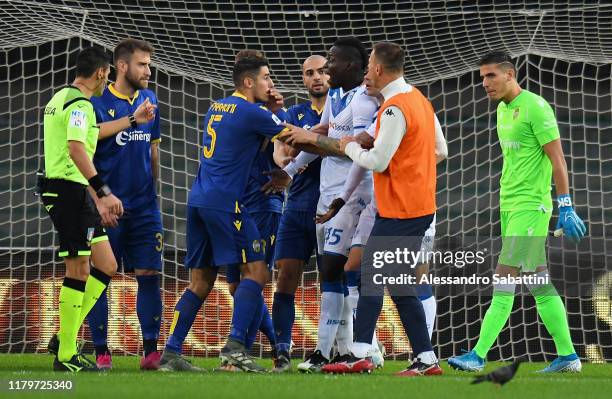 Mario Balotelli of Brescia Calcio reacts to racist chants from Verona fans during the Serie A match between Hellas Verona and Brescia Calcio at...