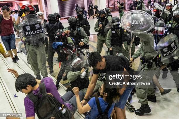 Riot police uses pepper spray as they attempt to make arrest in a shopping mall during a rally on November 3, 2019 in Hong Kong, China. Hong Kong...