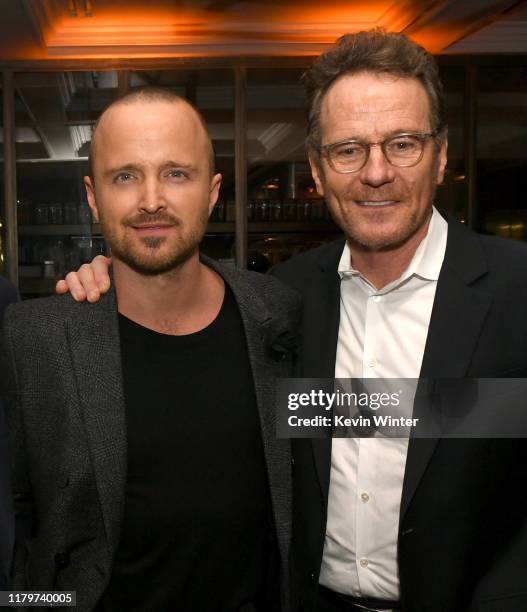Aaron Paul and Bryan Cranston pose at the after party for the premiere of Netfflix's "El Camino: A Breaking Bad Movie" at Baltaire on October 07,...