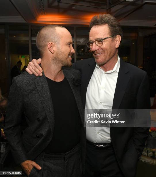 Aaron Paul and Bryan Cranston pose at the after party for the premiere of Netfflix's "El Camino: A Breaking Bad Movie" at Baltaire on October 07,...