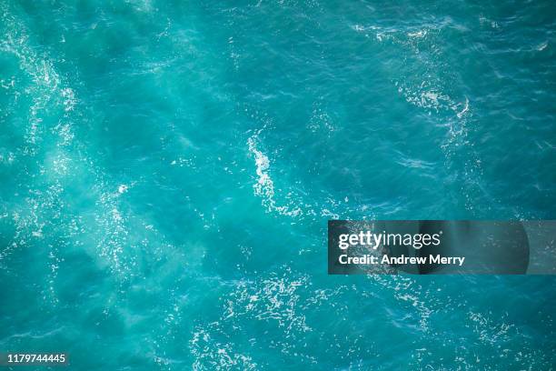 turquoise blue sea water wave pattern, aerial view, australia - helicopter point of view stock pictures, royalty-free photos & images