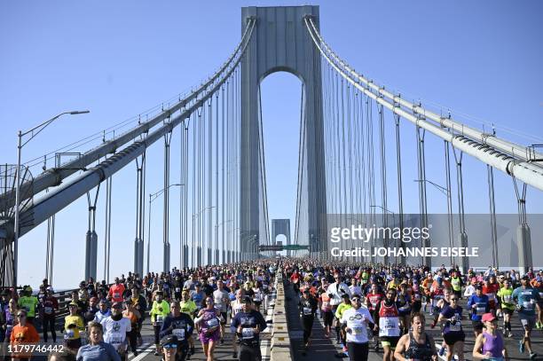 Runners cross the Verrazzano-Narrows Bridge during the 2019 TCS New York City Marathon in New York on November 3, 2019.