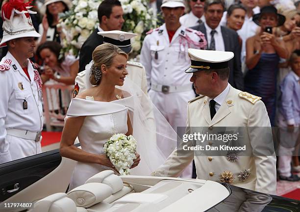 Princess Charlene of Monaco and Prince Albert II of Monaco make their journey to Sainte Devote church after their religious wedding ceremony at the...