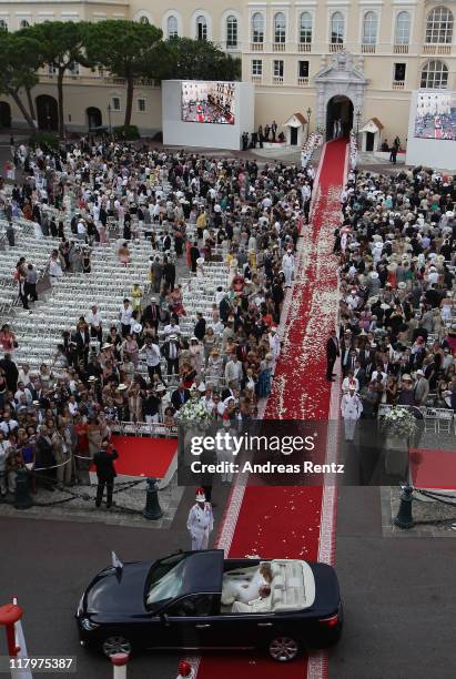 Prince Albert II of Monaco and Princess Charlene of Monaco make their journey to Sainte Devote church after their religious wedding ceremony at the...