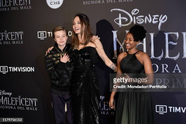 American actress Angelina Jolie and her children Shiloh Nouvel Jolie-Pitt and Zahara Marley Jolie-Pitt during the European premiere of the Disney...