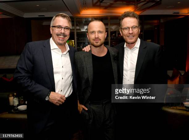 Vince Gilligan, Aaron Paul and Bryan Cranston pose at the after party for the premiere of Netfflix's "El Camino: A Breaking Bad Movie" at Baltaire on...