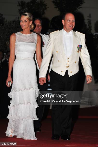 Princess Charlene of Monaco and Prince Albert II of Monaco attend a dinner at Opera terraces after their religious wedding ceremony on July 2, 2011...