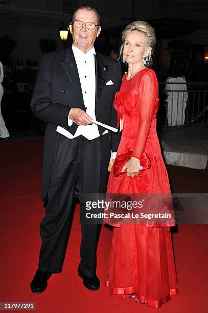Sir Roger Moore and wife Kristina Tholstrup attend the official dinner and firework celebrations at the Opera Terraces after the religious ceremony...