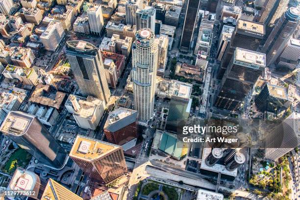 high over downtown los angeles - downtown los angeles aerial stock pictures, royalty-free photos & images