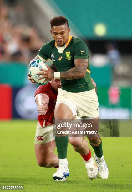 Elton Jantjies of South Africa runs with the ball during the Rugby World Cup 2019 Group B game between South Africa and Canada at Kobe Misaki Stadium...