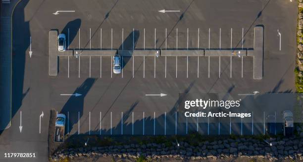 aerial -few cars parking in a parking lot. - small group of objects stock pictures, royalty-free photos & images