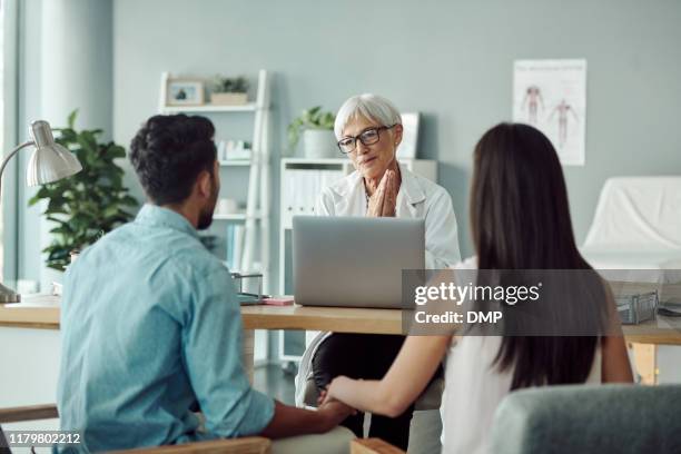 i will get both of you through this - young couple talking stock pictures, royalty-free photos & images