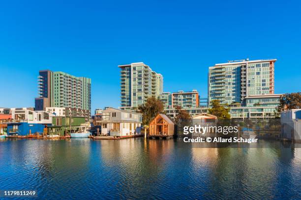 houseboats on mission creek channel in san francisco - san francisco californië stock pictures, royalty-free photos & images