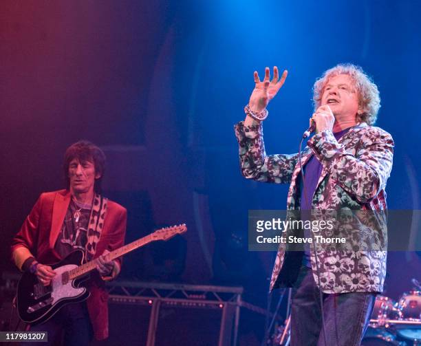Ronnie Wood and Mick Hucknall of The Faces perform on stage during the second day of Cornbury Festival on July 2, 2011 in Oxford, United Kingdom.