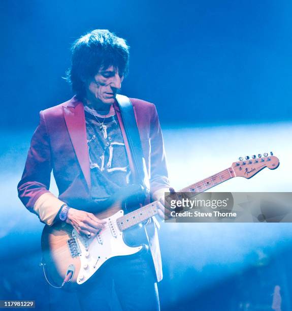 Ronnie Wood of The Faces performs on stage during the second day of Cornbury Festival on July 2, 2011 in Oxford, United Kingdom.