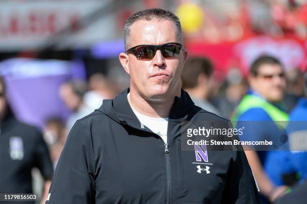 Head coach Pat Fitzgerald of the Northwestern Wildcats on the field before the game against the Nebraska Cornhuskers at Memorial Stadium on October...
