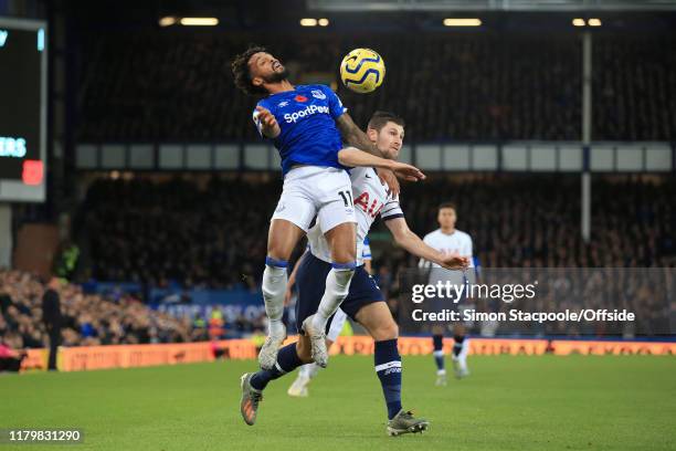 Theo Walcott of Everton battles with Ben Davies of Spurs during the Premier League match between Everton FC and Tottenham Hotspur at Goodison Park on...