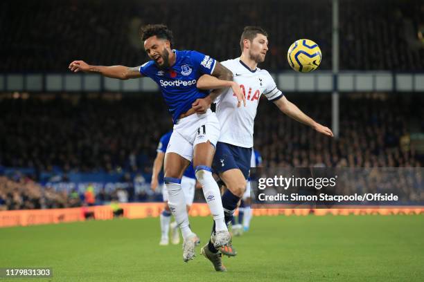 Theo Walcott of Everton battles with Ben Davies of Spurs during the Premier League match between Everton FC and Tottenham Hotspur at Goodison Park on...