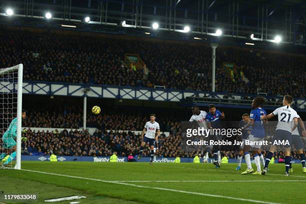 Cenk Tosun of Everton scores a goal to make it 1-1 during the Premier League match between Everton FC and Tottenham Hotspur at Goodison Park on...