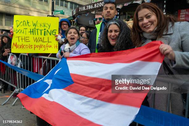 Sign reading "Don't worry about hitting the wall Mexico is paying for it" seen during the 2019 TCS New York City Marathon on November 3, 2019 in New...