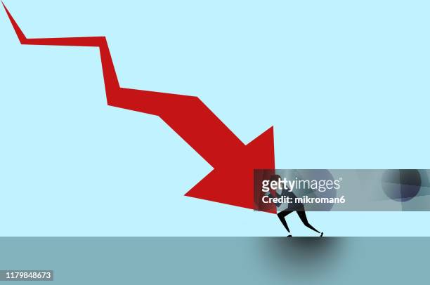 arrow going down and question mark and man stopping it - wirtschaftskrise stock-fotos und bilder