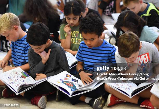 Students at Peter Burnett, Elementary School reading along with Los Angeles Rams running back Todd Gurley and his former University of Georgia...