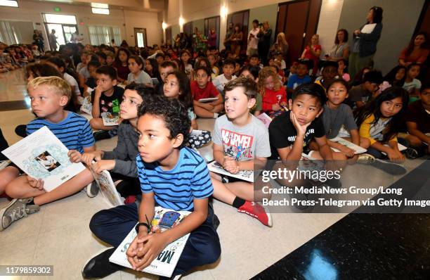 Students at Peter Burnett, Elementary School reading along with Los Angeles Rams running back Todd Gurley and his former University of Georgia...