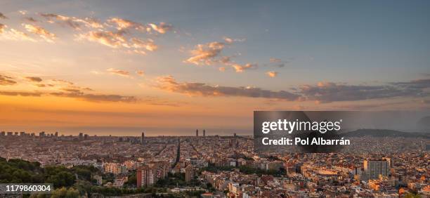 skyline of barcelona during sunrise. catalonia, spain - tibidabo fotografías e imágenes de stock