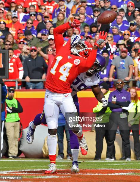 Cornerback Xavier Rhodes of the Minnesota Vikings brakes up a pass in the end zone intended for wide receiver Sammy Watkins of the Kansas City Chiefs...