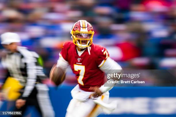 Dwayne Haskins of the Washington Redskins runs with the ball during the fourth quarter against the Buffalo Bills at New Era Field on November 3, 2019...