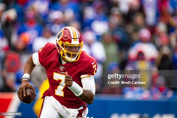 Dwayne Haskins of the Washington Redskins runs with the ball during the fourth quarter against the Buffalo Bills at New Era Field on November 3, 2019...