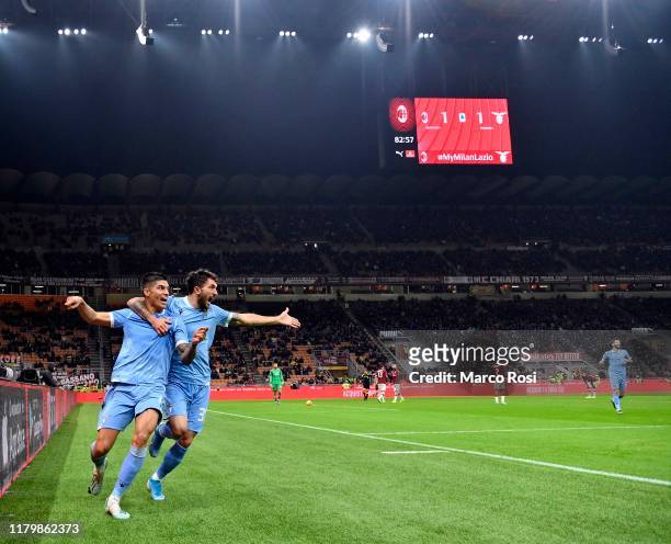Joaquin Correa of SS lazio celebrates a second goal with his team mates during the Serie A match between AC Milan and SS Lazio at Stadio Giuseppe...