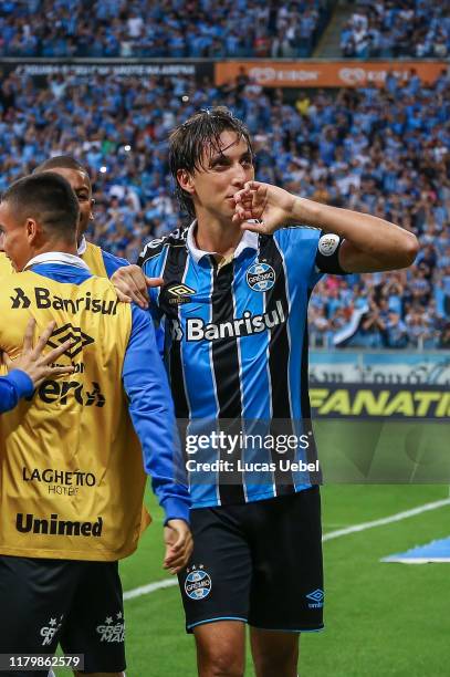 Pedro Geromel of Gremio celebrates their first goal during the match between Gremio and Internacional as part of Brasileirao Series A 2019 at Arena...