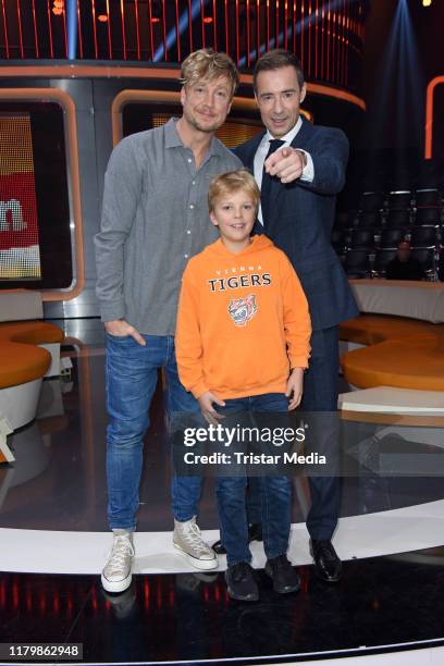 Samu Haber of the band Sunrise Avenue, Oscar and Kai Pflaume during the ARD TV show "Klein gegen Gross" at Studio Adlershof on November 3, 2019 in...